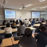 ルネサスエレクトロニクス株式会社エンベデッドプロセッシンググループの 濱田正一 氏による特別講義を実施